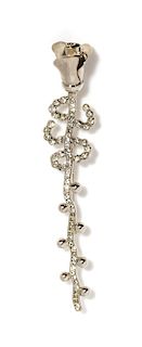 A Gianni Versace Floral and Rhinestone Brooch, 1" x 5.25".
