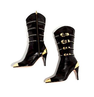 A Pair of Gianni Versace Black Leather and Gold Tip Boots, Size 38 1/2.