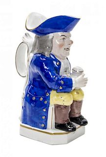 An English Ceramic Toby Jug, Height 8 1/4 inches.