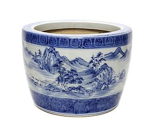 A Chinese Export Style Porcelain Blue and White Painted Jardiniere, Height 9 1/2 x diameter 13 inches.