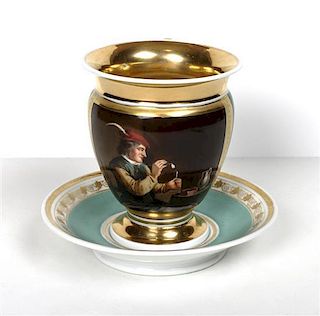 A Paris Porcelain Cup and Saucer Set, Height of first 4 1/4 inches.