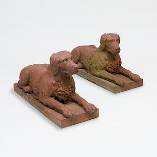 Pair of Fiske Cast-Iron Figures of Recumbent Newfoundland Dogs