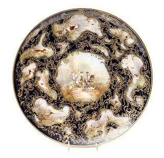 A Limoges Porcelain Charger, Diameter of each 12 1/2 inches.