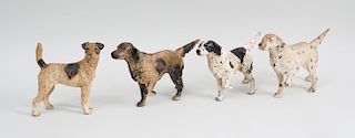Three Painted Cast-Iron Setters-On-the-Scent Door Stops, and a Painted Cast-Iron Terrier-Form Door Stop