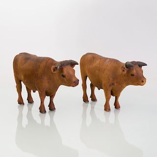 Two Carved Wood Figures of Bulls