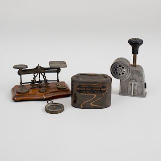 Multipost Mailer's Stamp Affixer, An English Brass-Mounted Postal Scale, a Metal Franklin County National Bank Savings Box and a Small Compass