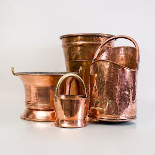 Large Copper Tapered Cylindrical Bucket, a Copper Scuttle, a Two-Handled Beaker Bucket and a Small Bucket with Brass Swing Handle