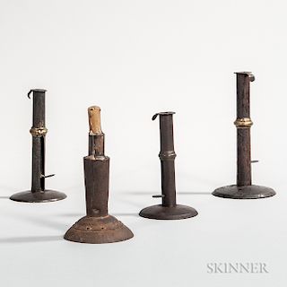 Three Brass-banded Iron Hogscraper Candlesticks and an Iron Make-do Candlestick
