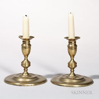 Pair of Early Round-base Brass Candlesticks