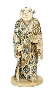 A Japanese Carved Ivory Okimono, Height 5 3/8 inches.