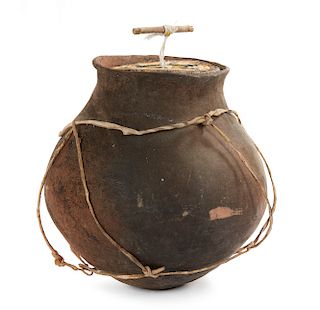 Tarahumara Clay Pot with Leather Straps and Lid.