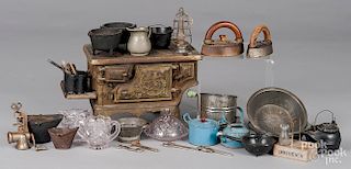 Child's cast iron stove and kitchen accessories