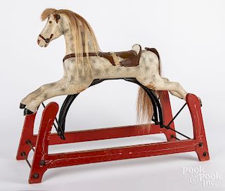 Wooden painted rocking horse