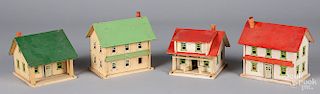 Four Schoenhut small painted wood train houses