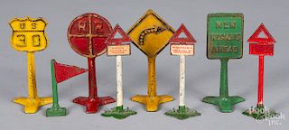 Five Arcade cast iron street signs
