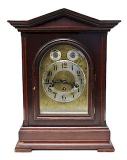 A Georgian Style Mahogany Bracket Clock, Junghans, Height 18 inches.