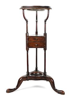 A George III Mahogany and Pewter Wig Stand, Height 29 inches.