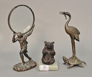 Group of three bronze items to include bronze figure hold magnifying glass bronze crane standing on a turtle back, ht