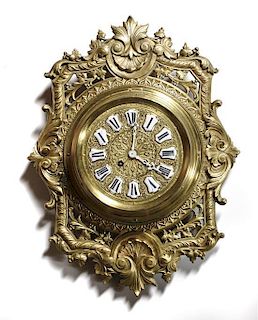 A Louis XVI Style Brass Wall Clock, Height 17 1/2 inches.