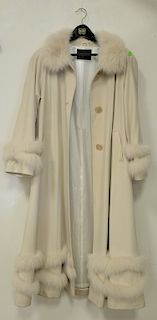 Two piece lot to include a womans Belle Fare cashmere and fox fur cape coat (large) and a fox fur shawl. (hangers are not included)
