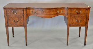 Two piece lot to include a George III style mahogany sideboard (ht. 36in., wd. 72in.) and a two drawer mahogany server.