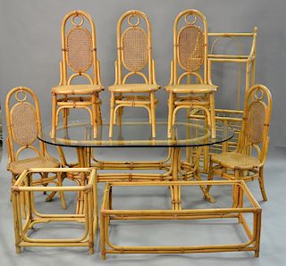 Large bamboo dining set to include glass top table, five chairs, bar, coffee table, and side table along with two piece wicker. tabl...