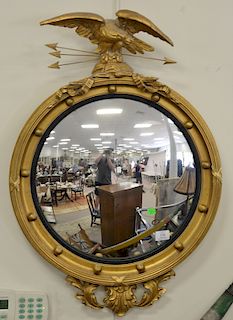 Federal style round convex Bullseye mirror with carved edge top. 32" x 22"