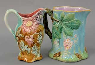 Two Majolica pitchers Frie Onnaing 812 floral pitcher and large water pitcher with frogs. ht 8in. each