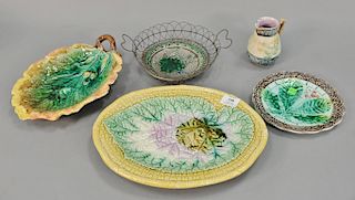 Five Majolica pieces to include an oval leaf platter, oak leaf dish, small pitcher, and two small dishes. pitcher: ht. 4 1/2in.