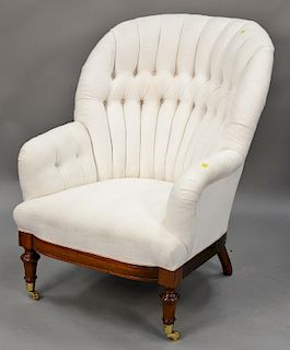 Victorian style upholstered chair in white.