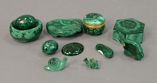 Malachite group to include a jewelry box, pill box, two carved snails, two eggs, two small dishes, horned animal, and two small poli...