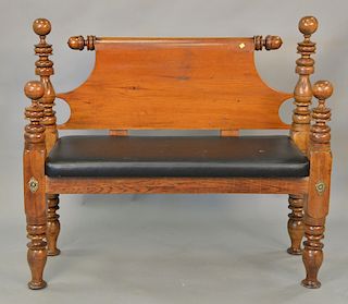 Cannonball bed made into bench. ht. 47in., wd. 53in.