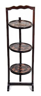 A Victorian Mahogany Folding Muffin Stand, Height overall 34 1/2 inches.