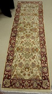 Two Oriental rugs including an Oriental runner 2'6" x 8' and a throw rug 3' x 5'.