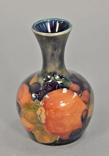 Moorcroft English pottery bud vase with original paper label on the bottom. ht. 3 3/4in.