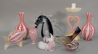Group of Murano art glass pieces to include pink and white candlestick, pair of pink and white stripe vases with handles, three cand...
