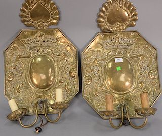 Pair of brass embossed double candle sconces, top embossed with heart and crown, electrified. 26 1/2" x 16"