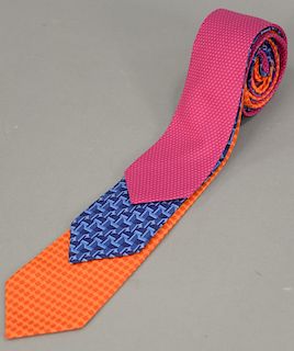 Assorted group of three Hermes silk ties. wd. 3 1/2in.