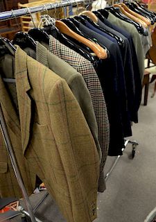 Clothing rack of mens suits and mens pants including Dockers and Brooks Brothers (hangers are not included)