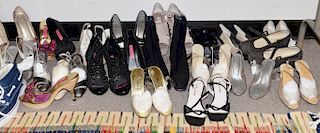 Twenty-five pairs of womans shoes including Steve Madden, Rene, Nina, Betsey Johnson, along with box lot with gloves, purses, and ot...