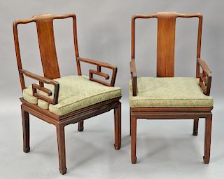 Pair of Chinese hardwood armchairs.