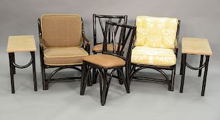 Six piece chocolate finish rattan set to include two armchairs, two side chairs, and two side tables. ht. 20in., top: 12" x 26"