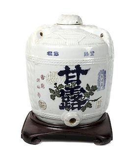 A Japanese Porcelain Sake Jar, Height 18 inches.