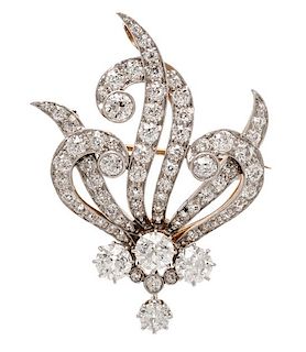 * An Edwardian Platinum Topped Gold and Diamond Pendant/Brooch, T. B. Starr, 10.75 dwts.
