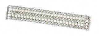 * A Platinum, Diamond and Cultured Pearl Bracelet, 43.30 dwts.