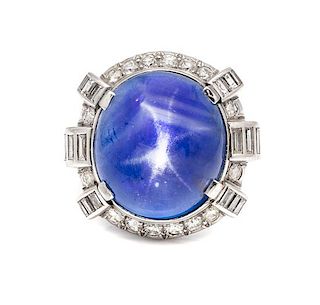 A Platinum, Star Sapphire and Diamond Ring, 11.10 dwts.
