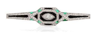* An Art Deco Platinum, Diamond, Onyx and Emerald Bar Brooch, French, 7.40 dwts.