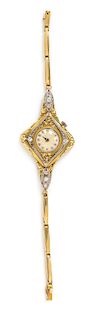 A Belle Epoque 18 Karat Yellow Gold, Platinum and Diamond Wristwatch, French, 19.90 dwts.