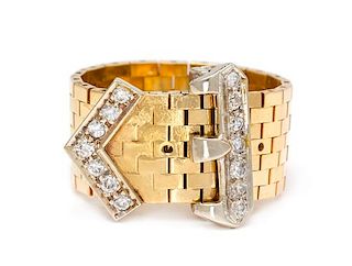 * A Bicolor Gold and Diamond Articulated Belt Ring, 6.90 dwts.