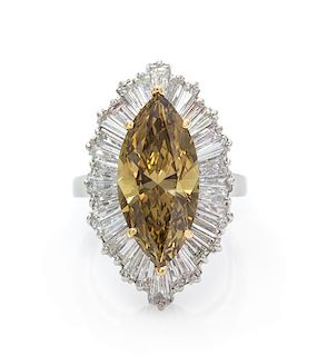 * A Platinum, Yellow Gold, Treated Fancy Dark Brown-Yellow Diamond and Diamond Ring, 9.10 dwts.